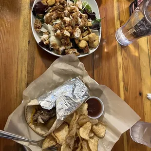 Crispy chicken salad with ranch dressing; Pig in a Pickle Jar pita sandwich with chips