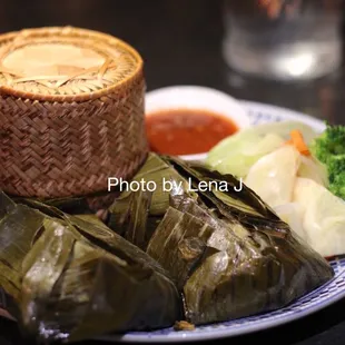 Ho Mok Pla (Lao Style Steamed Catfish) ($22) - steamed catfish folded in banana leaves. Great! Very flavorful.