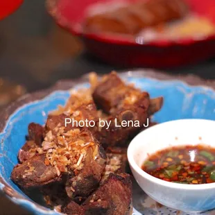 Garlic Pork Spareribs ($8 happy hour, $14 regular) - fried marinated pork spareribs topped with fried garlic