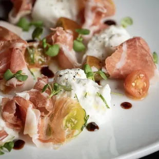 a plate of appetizers on a table