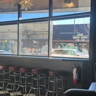Bar stools at the front window