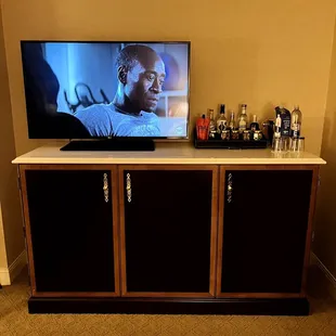 TV and paid-bar, coffee maker is inside the cabin