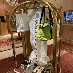 In the hotel lobby, wedding things.