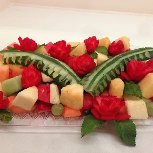a platter of fruit and vegetables