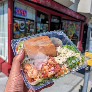 1/2 sandwuch and 2 scoops of salad $17