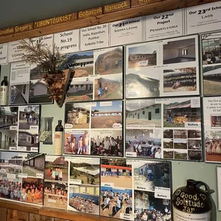 a wall full of old photos