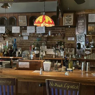 a bar with several bottles of alcohol
