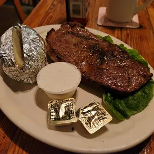Steak and baked potato.