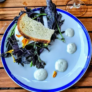 BURRATA AND MUSHROOMS: wild mushroom ragu, sourdough croutons, white asparagus.$18