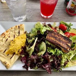 Blackened mahi on Mediterranean Salad