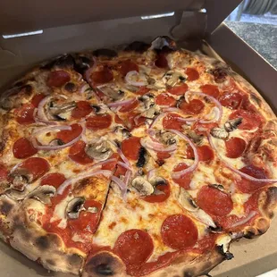 Turkey Peperoni with red onions and mushrooms Pizza