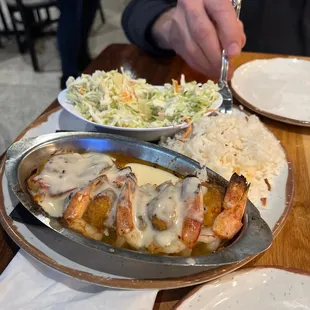 Coconut rice pineapple coleslaw and stuffed shrimp