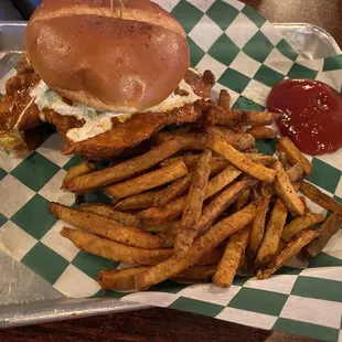 Buffalo Chicken sandwich with seasoned fries.