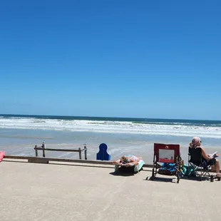 people relaxing on the beach