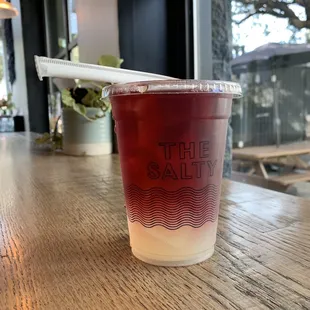 a drink in a plastic cup
