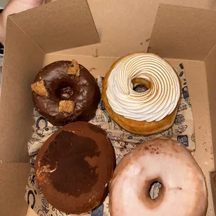 From top left clockwise- Gf chocolate chip cookie donut, strawberry tres leches, glazed, tiramisu