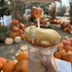 Pumpkin spice and brown butter donut with a pumpkin white mocha latte