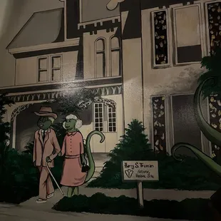 two people in front of a house