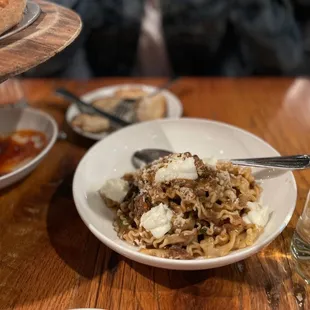 a plate of pasta and sauce