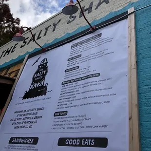 the menu on the outside of the building