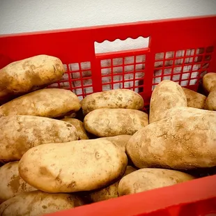 potatoes in a red basket
