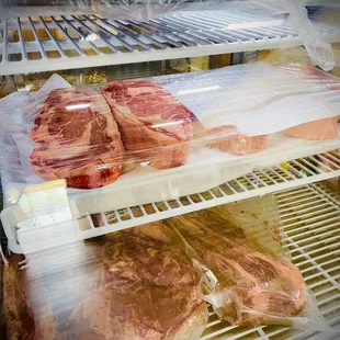 a rack of meat in a freezer