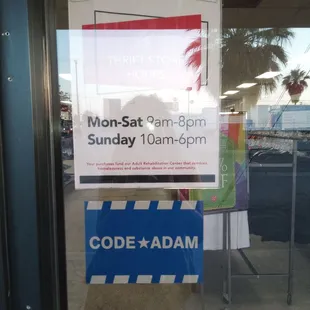 Store hours posted in the window