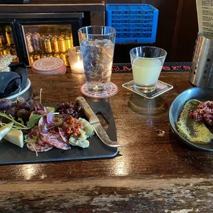 My idea of appetizer: amusement board, day of the dead cocktail and beef tartare