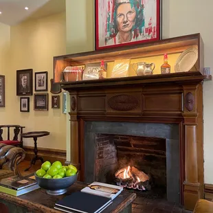 Beautiful parlor with photos and Maker's Mark artifacts