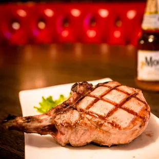 Grilled double bone-in pork chop