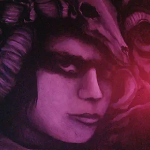 a woman wearing a horned headdress