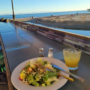 Waterfront, sun, salad, and margarita. Happy place.