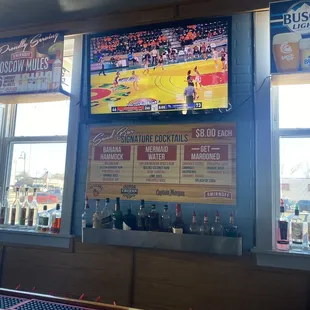 a basketball game on a big screen