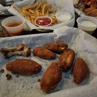 Chicken wings,  not greasy,  crunchy and cooked perfectly.