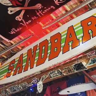 a surfboard hanging from the ceiling
