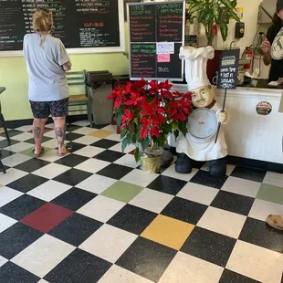 a woman standing at a counter