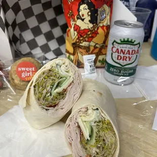 The 18. California Club Sandwich. Has rotisserie turkey, bacon, Monterey Jack, cucumber, sprouts, ranch dressing and a flour wrap.