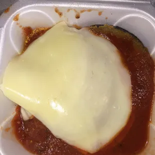 Side of eggplant parmigiana! Yummy! Great red gravy and cooked perfectly!