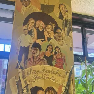 The people of the Mission mural inside with Sutro Tower on top