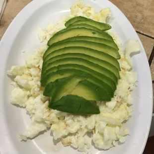 Protein style breakfast scrambled egg whites with avocado Yum!