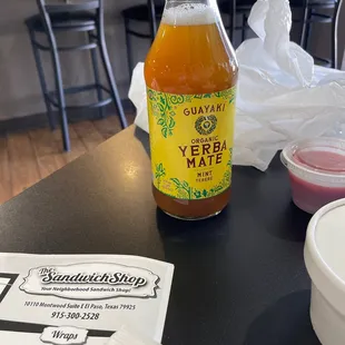 a bottle of mustard on a table