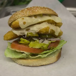 Breaded Chicken Bread with Swiss on a Hamburger Bun