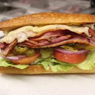 Hot Pastrami Sandwich with Swiss on a Sourdough Hard Roll