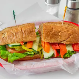 #32) Red Hot Chili Peppers
Cold Sandwich. Roasted red pepper hummus, roasted red peppers, avocado, cucumbers &amp; sriracha.( Vegan )