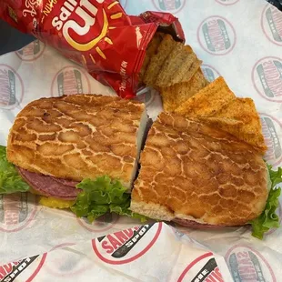 a bag of chips and a sandwich