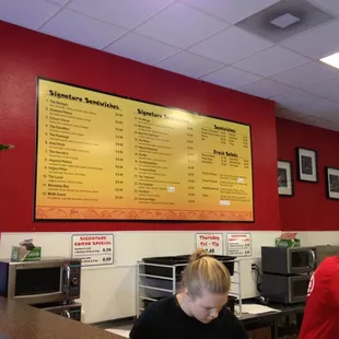 menu on wall , Vegas theme sandwich names