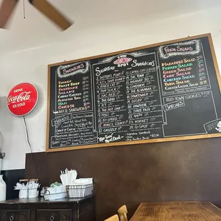 Picking up turkey avocado on Dutch crunch