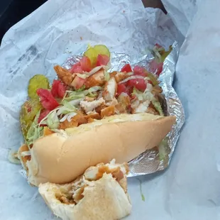 a hot dog with various toppings