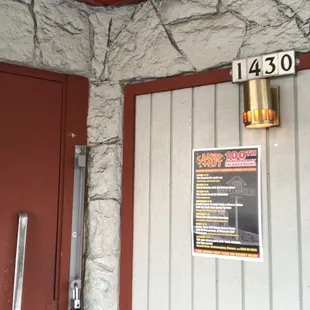 Entrance with 100 year party flyer