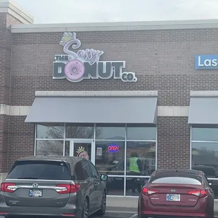 cars parked in front of the store